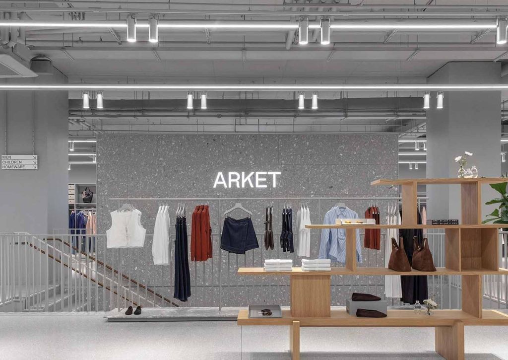Arket Dublin with terrazzo feature wall and oak display