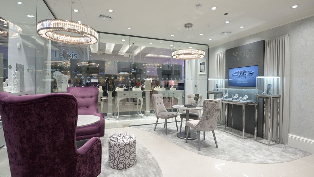 Beaverbrooks consultation lounge with velvet chairs and chandeliers