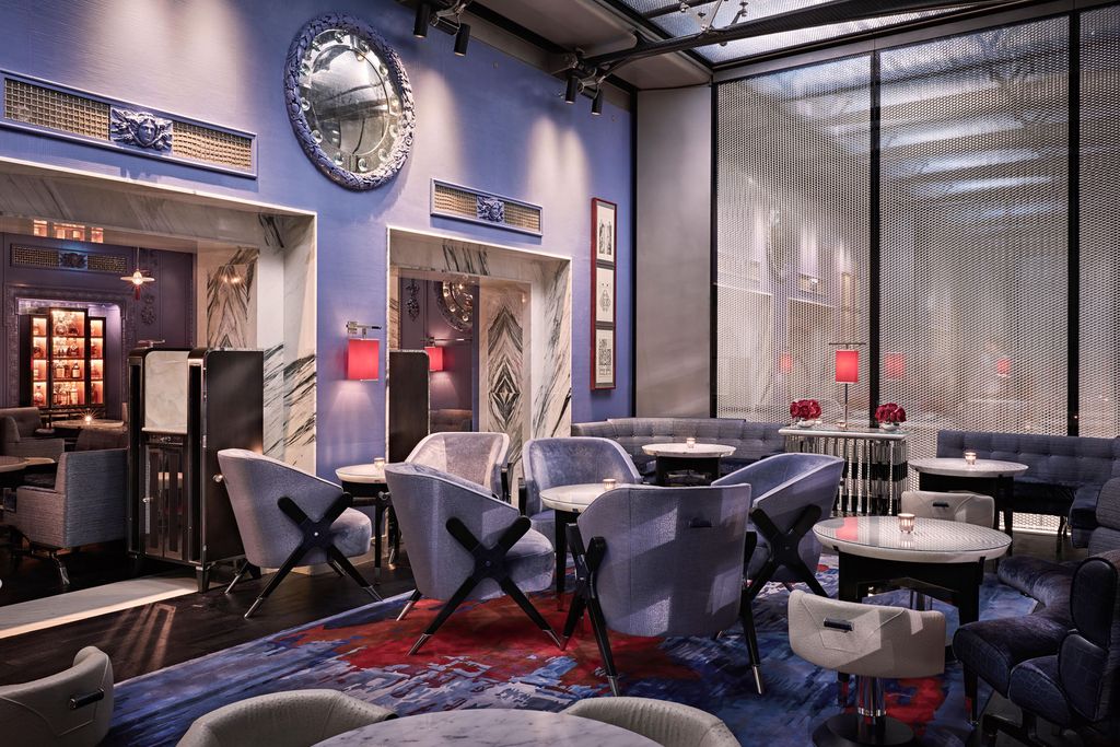 Blue Bar at The Berkeley with porthole mirror and lounge seating