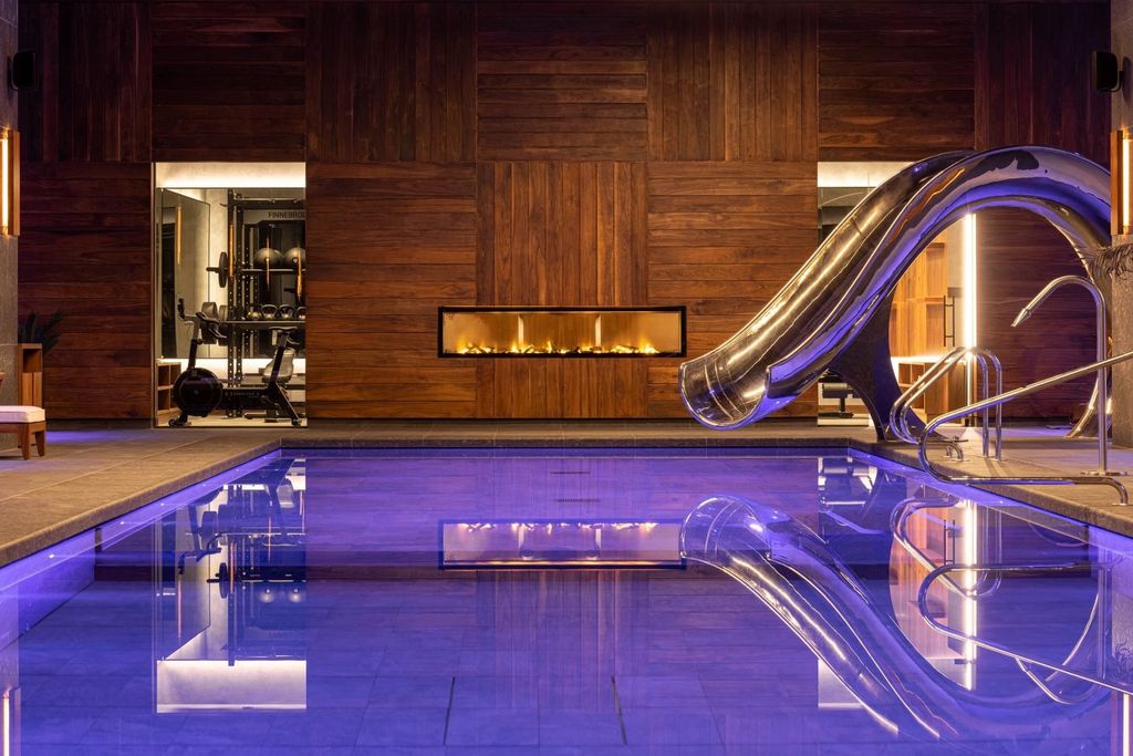 Private pool and spa with walnut wall and slide, County Down