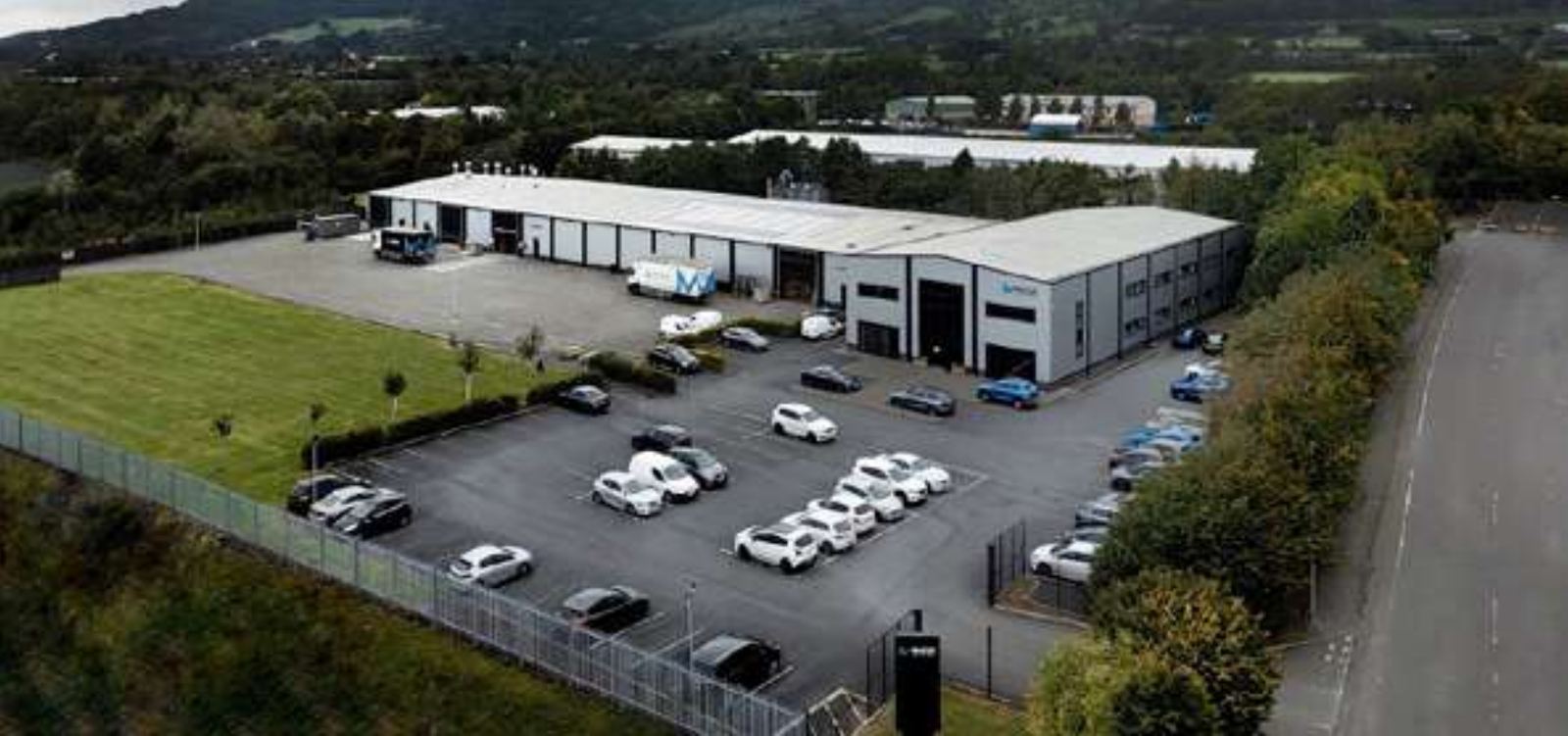 Aerial view of McCue's head office and 5,500 m² joinery facility in Carrickfergus