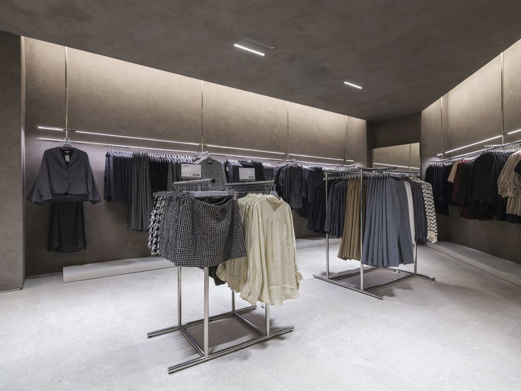 H&M Stratford womenswear floor with rails in a calm grey shell