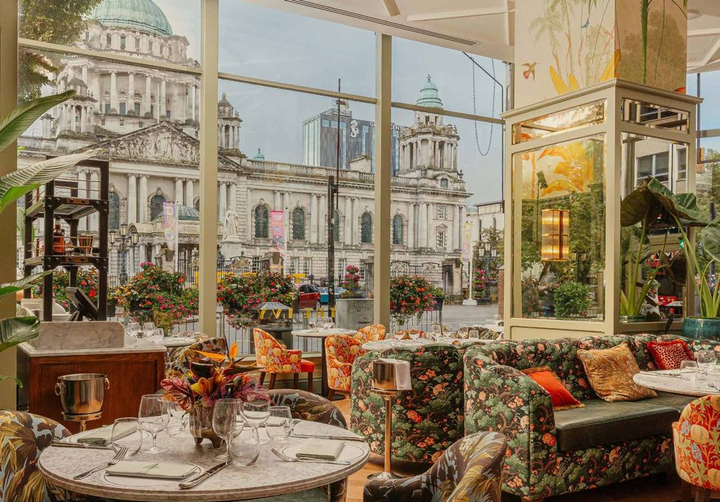 The Ivy Belfast dining room with views across to Belfast City Hall