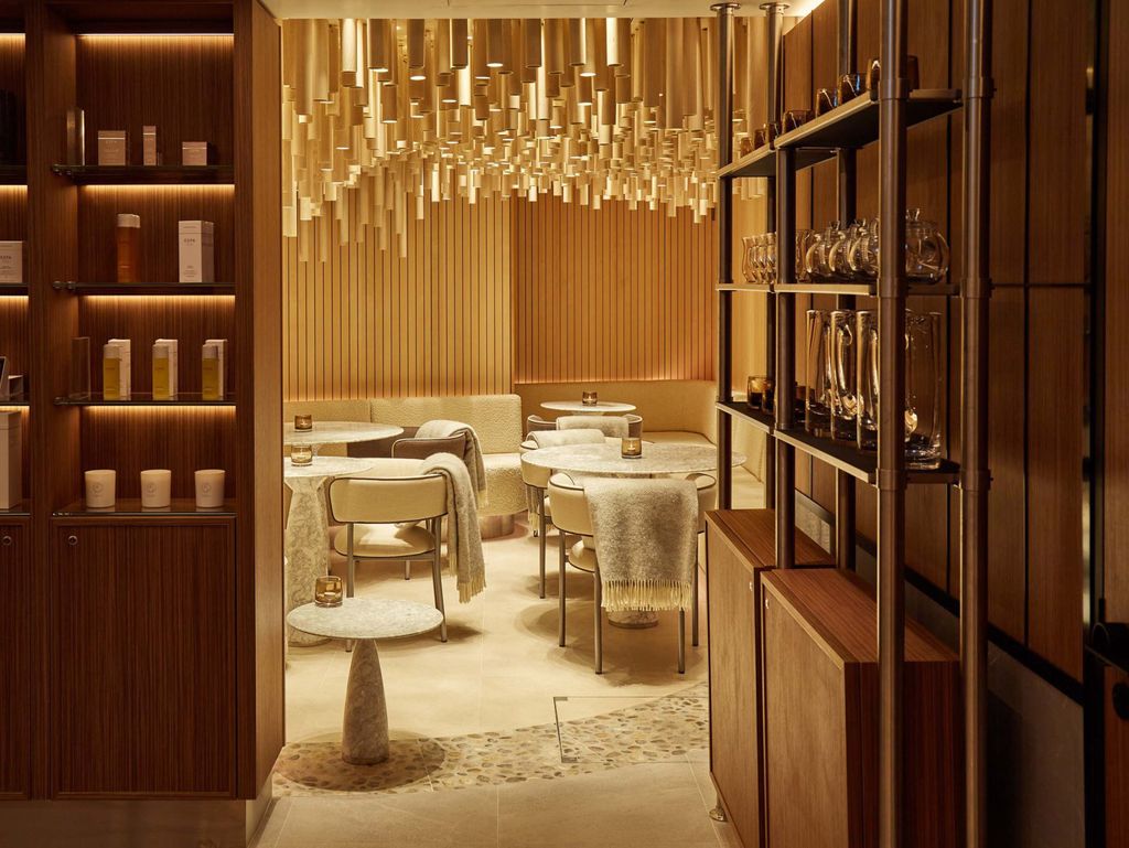 King Street Spa relaxation lounge beneath a copper leaf installation