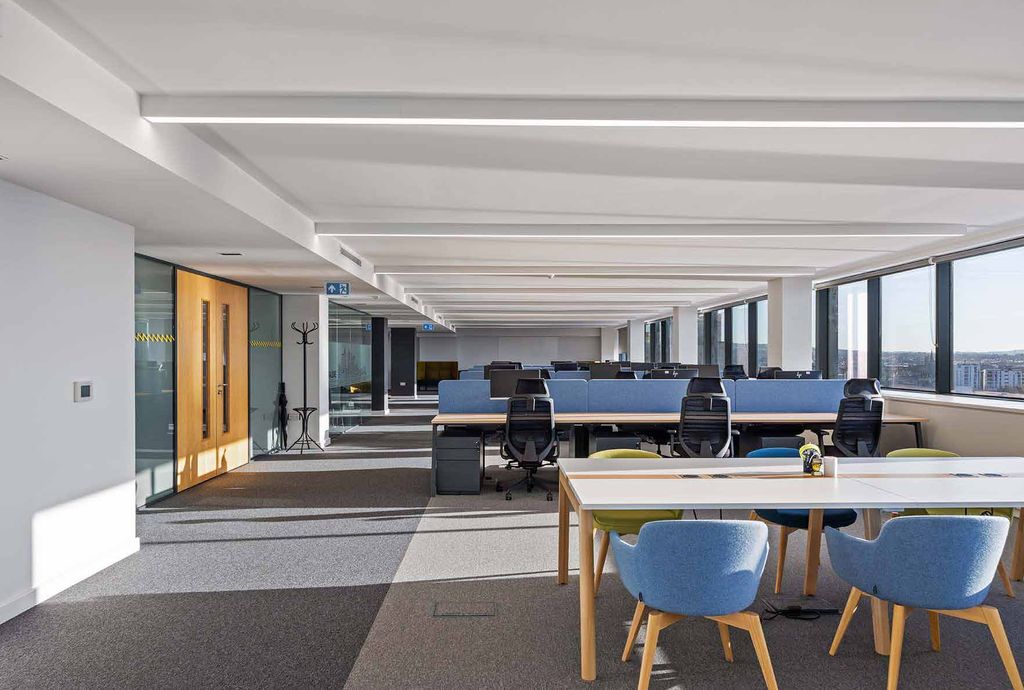 River House open-plan office with timber doors and city views