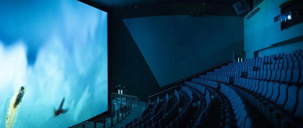 Science Museum IMAX theatre with giant screen and raked seating