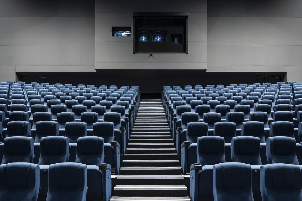 Science Museum IMAX auditorium with tiered blue seating