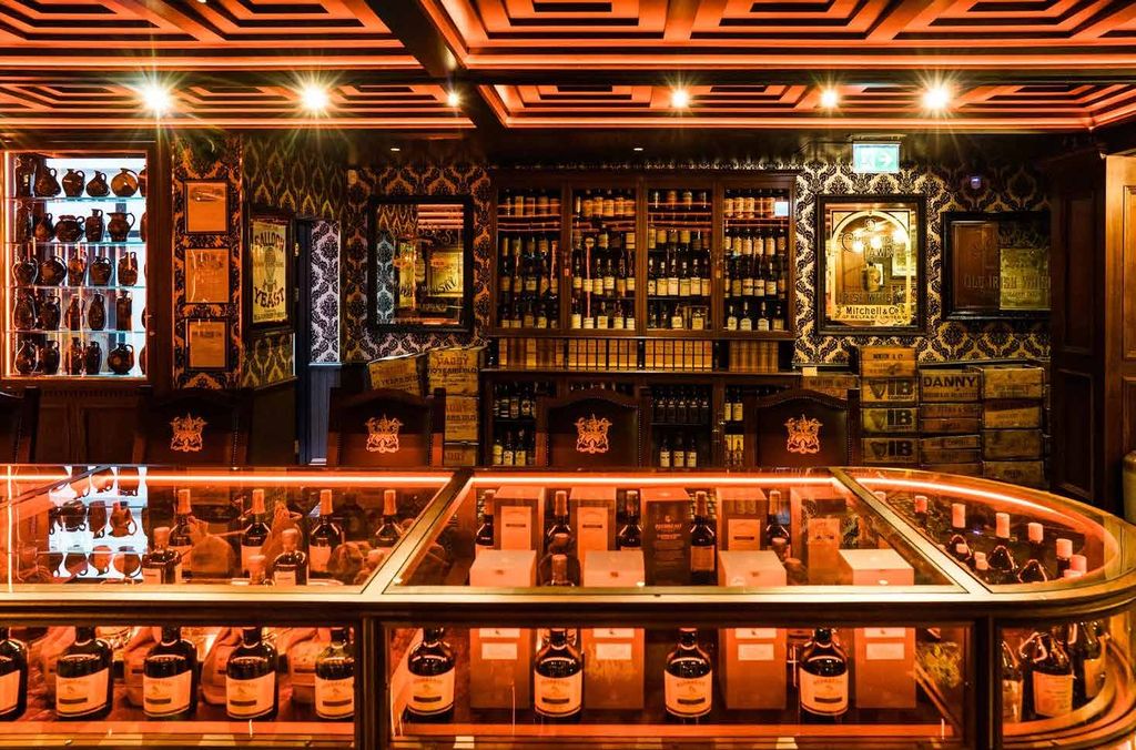 Whiskey Museum bar with lit glass display counter
